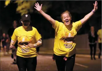  ??  ?? Julie O’Reilly reaches the crest of the Putland Hill in last year’s Darkness into Light.