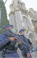  ?? ERIC GAILLARD/POOL VIA AP ?? French police officers on guard.