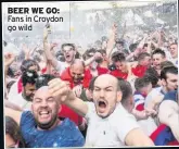  ??  ?? BEER WE GO: Fans in Croydon go wild