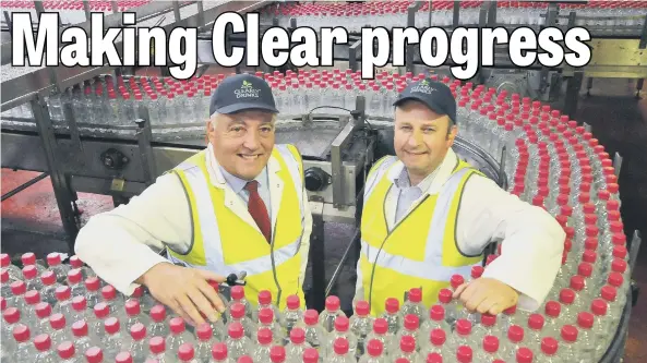  ??  ?? Sunderland City Council’s Coun Mel Speding (left), with Mark Bell, operations director at Clearly Drinks.