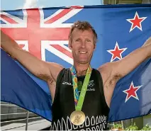  ?? PHOTOSPORT ?? Mahe Drysdale celebrates winning gold in the men’s singles at the 2016 Rio Olympic Games.