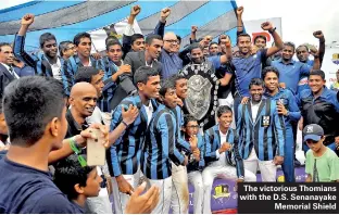  ??  ?? The victorious Thomians with the D.S. Senanayake Memorial Shield