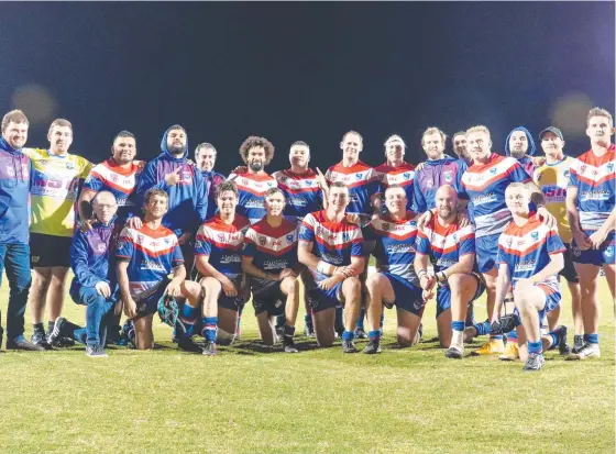  ??  ?? BRISBANE BOUND: The Toowoomba Clydesdale­s celebrate their win over Mackay. Photo: Cameron Stallard/QRL Media