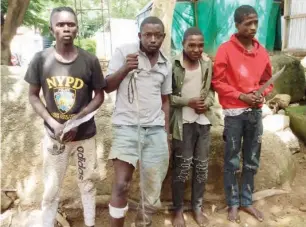 ?? PHOTOS Lami Sadiq ?? Some arrested members of sara-suka in the custody of OPSH. Ahmed Abubakar, (in black shirt) is said to be rising through the ranks and confessed to owning a gun.