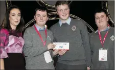  ??  ?? Ruth Murphy, Chief Counsel Business and Public Sector BT presents the Technology Intermedia­te Group third place award to Kian Trant, Seamus Knightly and Conor Crowley of CBS Secondary School, Tralee for their project ‘Blind and Elderly Assistance...