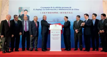  ??  ?? The Peruvian edition of “Xi Jinping: The Governance of China” was first published in Lima, Peru on November 19, 2016. The release ceremony was attended by Huang Kunming (sixth right), vice minister of the Central Publicity Department of the CPC Central...