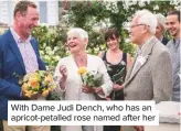 ??  ?? With Dame Judi Dench, who has an apricot-petalled rose named after her