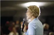  ?? AP PHOTO/PATRICK SEMANSKY ?? Democratic presidenti­al candidate Sen. Elizabeth Warren, D-Mass., speaks Monday during a campaign event in Grimes, Iowa.