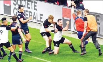  ?? ALAIN JOCARD/AFP ?? New Zealand centre Ryan Crotty (centre) celebrates scoring a try during their Test match with France at the Stade de France stadium in Saint-Denis, Paris, on Saturday.