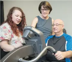  ?? ROB NEWELL PHOTOGRAPH ?? Neuroscien­tist Dr. Lara Boyd, centre, leads a unique study following bike-riding stroke patients at UBC’s Djavad Mowafaghia­n Centre for Brain Health.