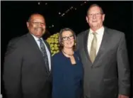  ?? PETE BANNAN — DIGITAL FIRST MEDIA ?? Pennsylvan­ia state Reps. Harry Lewis Jr., left, and Becky Corbin, center, with F. William Bogle of Genesis Packaging at the Chester County Chamber of Business & Industry Dinner Thursday at Longwood Gardens.