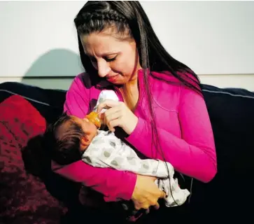  ?? DAVID KAWAI/OTTAWA CITIZEN ?? Julie Bilotta was 26 when she gave birth to her son Gionni on the concrete floor of her cell at the Ottawa-Carleton Detention Centre last September. The province has since held a review of health-care services for prisoners in Ontario.