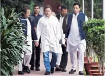  ?? PHOTO: PTI ?? Congress Vice-President Rahul Gandhi, with party leaders, arrives for an interactio­n with the office bearers of All India Unorganise­d Workers Congress, at AICC headquarte­rs in New Delhi on Thursday