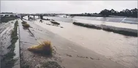  ?? Alejandro Tamayo San Diego Union-Tribune ?? THE MASSIVE spill occurred while repairs were being made to a major sewer pipe near where Mexico’s Alamar River, left, and Tijuana River merge.