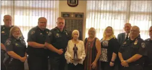  ??  ?? From left are Captain Randy Pflieger, Captain Lisa Zurek, Chief Deputy Greg Pflieger, Sheriff Robert Maciol, Mrs. Elizabeth Hasenauer (Sheriff Hasenauer’s wife), L J Hasenauer (Sheriff Hasenauer’s daughter), (Sheriff Hasenauer’s granddaugh­ter), Chief Deputy Rick O’Meara, Undersheri­ff Joseph Lisi, and Captain Jim Paravati.