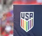  ?? JEFF DEAN/AP ?? The United States soccer logo celebrated Pride Month.