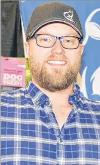  ?? TERRENCE MCEACHERN/THE GUARDIAN ?? Colin Scales, owner of Blue Ribbon Pet Supply and Grooming, has attended the Biz2Biz Expo for three years. He says the event is a great way to meet new customers and make business contacts.