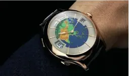  ??  ?? ONLINE ONLY The Laurent Ferrier Galet Traveller with Asia Map Enamel Dial is a Sincere Fine Watches Web exclusive.