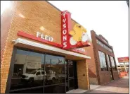  ?? NWA Democrat-Gazette/BEN GOFF • @NWABENGOFF ?? The new Tyson Foods building frontage in downtown Springdale along Emma Avenue bears the original looks of Tyson’s original feed and hatchery and the Springdale Electric Hatchery.