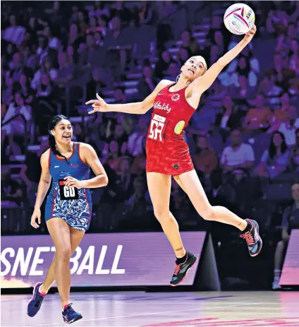  ??  ?? Full stretch: Helen Housby displays her athleticis­m to retrieve the ball during a crushing victory for England over Samoa