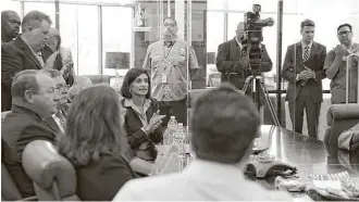  ?? Elizabeth Conley / Houston Chronicle ?? Seema Verma, center, director of the Centers for Medicare and Medicaid, thanks the Dialyspa staff, adding that she was sent by the Trump administra­tion to ask, “How can we do better?”