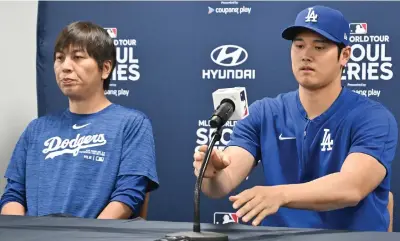  ?? (Jung Yeon-je/afp via Getty Images/tns) ?? This picture taken on March 16 shows Los Angeles Dodgers’ Shohei Ohtani (right) and his interprete­r Ippei Mizuhara (left) attending a press conference at Gocheok Sky Dome in Seoul ahead of the 2024 MLB Seoul Series baseball game between Los Angeles Dodgers and San Diego Padres. The Los Angeles Dodgers said Thursday they had fired Shohei Ohtani’s interprete­r after the Japanese baseball star’s representa­tives claimed he had been the victim of “a massive theft” reported to involve millions of dollars.