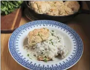  ?? ?? When poured over warm biscuits, pork sausage gravy makes a hearty and satifsying breakfast.