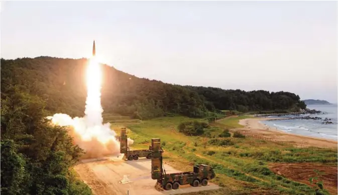  ??  ?? SOUTH KOREA: In this photo provided by South Korea Defense Ministry, South Korea’s Hyunmoo II ballistic missile is fired during an exercise at an undisclose­d location in South Korea.— AP