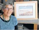  ?? Picture: SUPPLIED ?? VISUAL FEAST: Jen Rowland sits next to her gouache painting, one of the works to be on display at the Life Spring Exhibition.