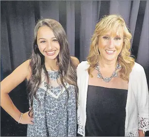  ?? AP PHOTO ?? In this July 8, 2015 photo, transgende­r teen Jazz Jennings, 14, left, poses with her mother Jeanette in New York. Since being interviewe­d on ABC’s “20/20” by Barbara Walters at age six, Jazz Jennings has emerged as a leading advocate, role model and...