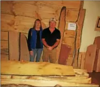  ?? PHOTO SPECIAL TO THE DISPATCH BY MIKE JAQUAYS ?? Laurie, left, and Kenny Wellington pose on Nov. 3in their recently purchased Wellington Woods shop in Madison.