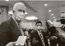  ?? Susan Walsh / Associated Press ?? Sen. John Cornyn, R-Texas, talks with reporters Tuesday after the first day of the second impeachmen­t trial.