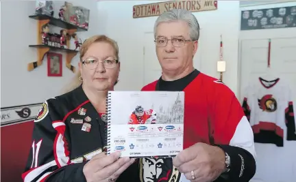  ?? TONY CALDWELL ?? Robert Giroux and his wife Jocelyne lost their usual seats at the Canadian Tire Centre when the Senators decided to reduce capacity by 1,500 for the upcoming season to boost demand.