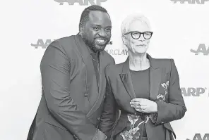  ?? MICHAEL KOVAC/ GETTY IMAGES ?? Brian Tyree Henry and Jamie Lee Curtis take to the red carpet. Henry presented Curtis with her career achievemen­t award.