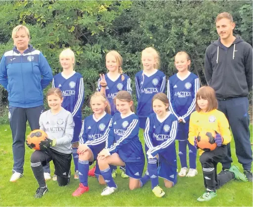  ??  ?? Macclesfie­ld Town Ladies under 11s, back row (ltor) Monica Pollard (coach) Elizabeth Lomas, Tatiana Pollard, Eleanor Boyd, Ebony Stewart, Ryan Stewart (assistant coach), Rosie Ashton, Isabel Gill, Holly Hurst and Kacey Bolton