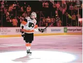  ?? DERIK HAMILTON/AP ?? The Flyers’ Travis Konecny acknowledg­es fans after he was chosen as star of the game Saturday against the New Jersey Devils in Philadelph­ia.