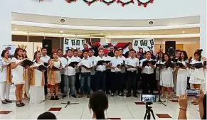  ??  ?? Season to sing: OV Singers and iGenVE performing a Christmas song at ITCC during the North Borneo Christmas Festival in Penampang.