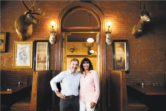  ?? Photos by Sarah Rice / Special to The Chronicle ?? John Pickerel and Melanie Bajakian-Pickerel operate Buckhorn Steakhouse in Winters, which has spawned a chain of restaurant­s in Northern California.