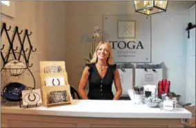  ?? PHOTOS BY LAUREN HALLIGAN — LHALLIGAN@DIGITALFIR­STMEDIA.COM ?? Deborah DePasquale is the owner and designer at new store Toga Heritage in downtown Saratoga Springs.