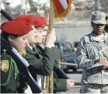  ??  ?? A United States Army Reserve sergeant drills high school students at a high school in Atlanta, Georgia. Canada also sits among the small handful of countries that allow 16-year-olds into the reserves (where deployment is optional).