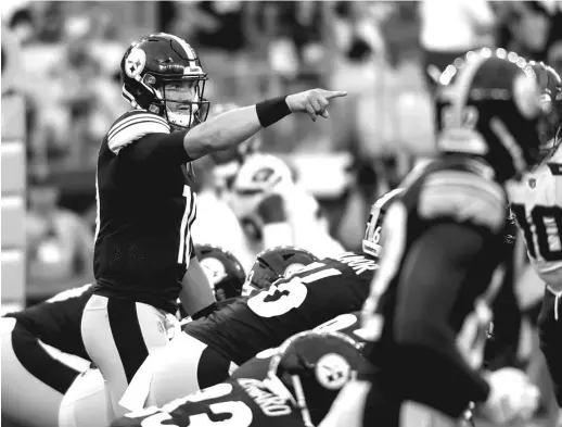  ?? GETTY IMAGES ?? Steelers quarterbac­k Mitch Trubisky, whom the Bears drafted with the second overall pick in 2017, signals to his receivers during the first quarter Saturday.