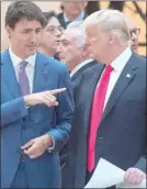  ?? The Canadian Press ?? PM Justin Trudeau speaks to U.S. President Donald Trump at the G20 summit Saturday, in Hamburg.