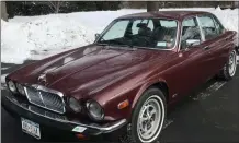  ?? PHOTO PROVIDED ?? Marylou Whitney’s 1985 red Jaguar XJ6 is available in the Marylou Whitney Collection Auction.