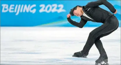  ?? AFP ?? Nathan Chen of the US performs his short program at the Beijing Winter Olympics on Feb 8.