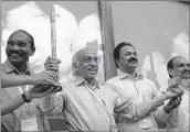  ??  ?? ISRO chairman Kiran Kumar Reddy (C) with his jubilant team.