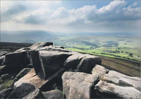  ??  ?? The view from Simon’s Seat near Bolton Abbey, looking down to Parcevall Hall and across to Barden Fell. Ensuring the Dales’ future prosperity will be a complex balancing act.