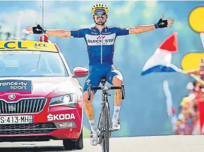  ?? Getty. ?? Quick-Step Floors’ Julian Alaphilipp­e claims his first stage victory at Le Grand-Bornand.