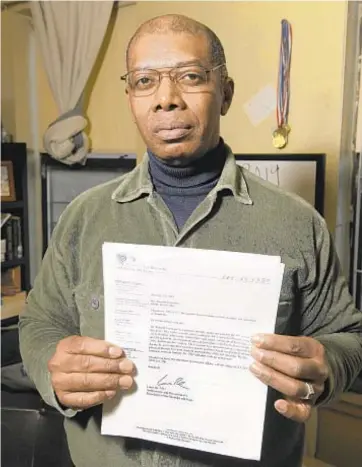  ?? BARRY WILLIAMS/DAILY NEWS ?? Ramon Cayetano shows letters from his doctor saying he could return to his job as a loader for FedEx, but the shipping company shut the door on the injured worker who had been there for 16 years.