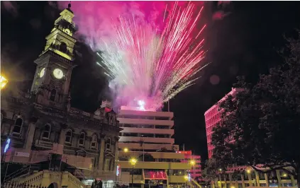  ?? PHOTOS: CHRISTINE O’CONNOR ?? What a blast . . . Fireworks mark the beginning of 2021 in the Octagon, Dunedin, watched and recorded by thousands of revellers.