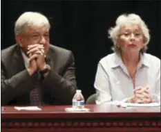  ?? CHRISTIAN TORRES - THE ASSOCIATED PRESS ?? In this Aug. 7 file photo, Mexico’s President-elect Andres Manuel Lopez Obrador and incoming Interior Secretary Olga Sanchez attend a meeting on security and national reconcilia­tion, in Ciudad Juarez, Mexico. Mexico’s incoming government says it does not plan to assume the role of “safe third country” for migrants seeking asylum in the U.S. after Lopez Obrador is sworn in as president on Dec. 1.